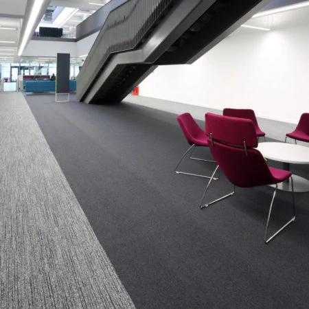 Grey carpeted school atrium