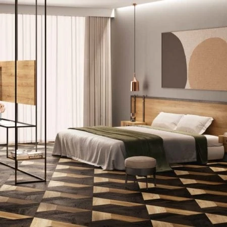 Hotel bedroom with geometric patterned carpet