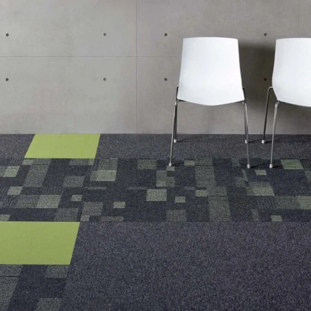 Carpet flooring tiles with simple white chairs against a wall