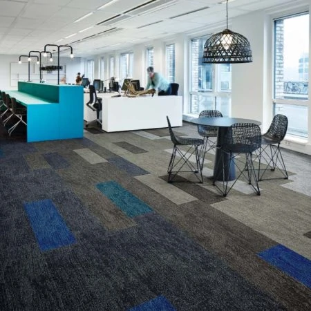 Modern office with grey and blue flooring