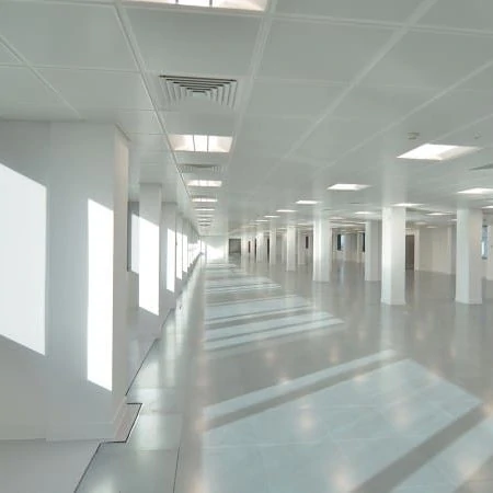 White, empty office floor with no furniture