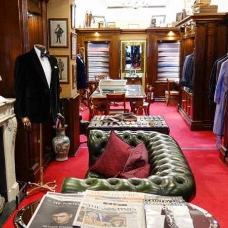 Shop interior with leather sofa and men's suits