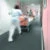 Hospital corridor with patient being wheeled through on stretcher