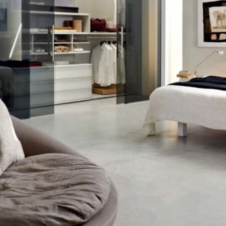 Bedroom with polished concrete floor