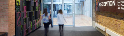 Children walking through school entrance