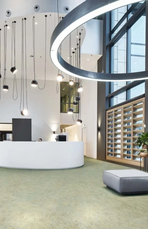 Modern atrium with pale green vinyl flooring